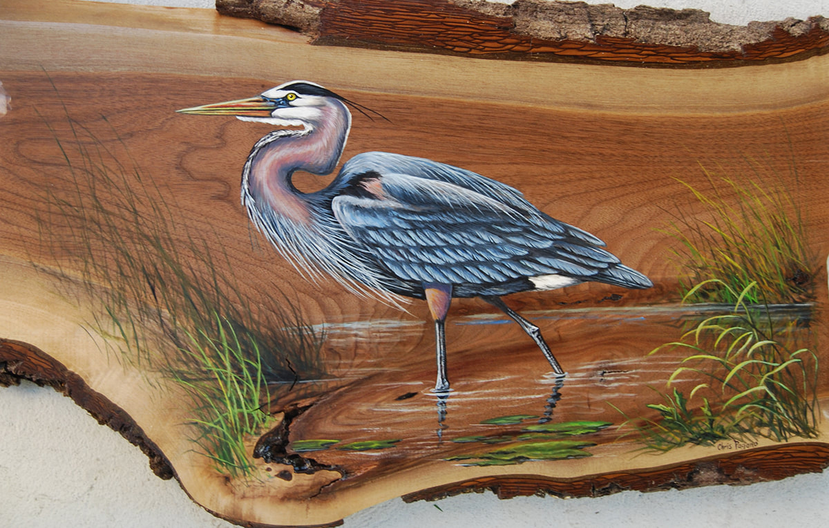 Bird painted onto wood by Chris Pagano
