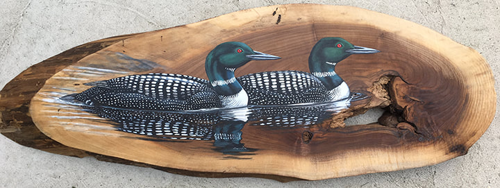 Two ducks painted onto wood by Chris Pagano